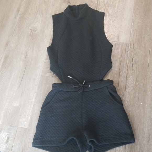 Onepiece Pants - One piece black romper with cut outs